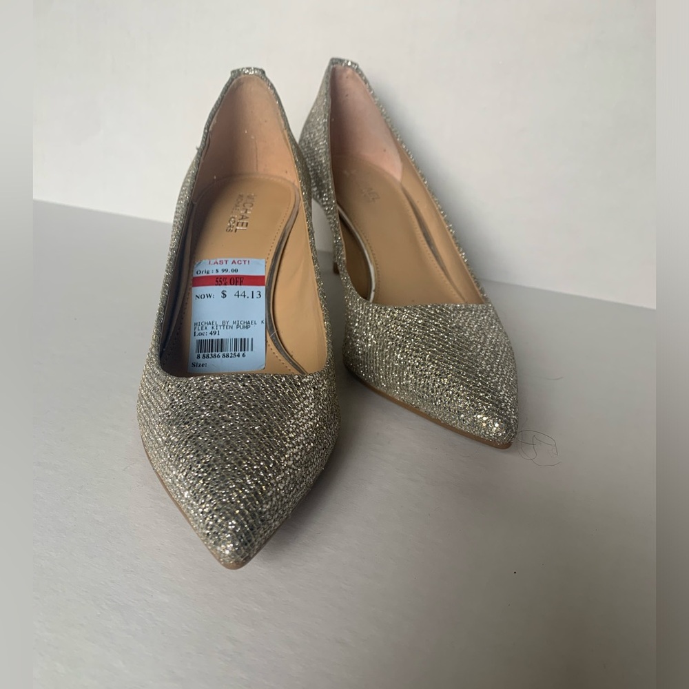 Michael Kors silver kitten heels.